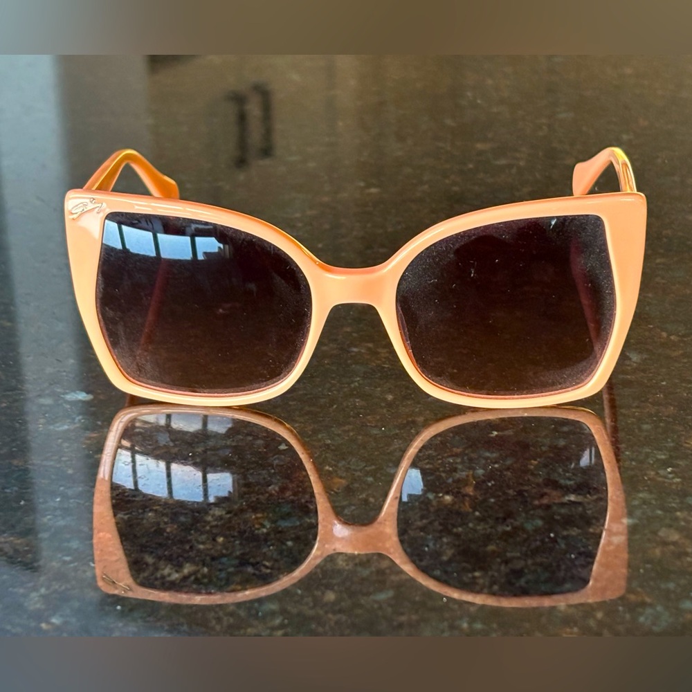Brand new DESIGNER sunglasses with original case.